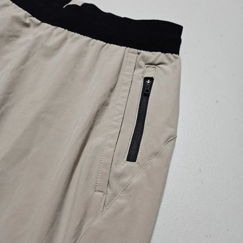 The North Face Essential Pant Mens S Outdoor Stretch TNF Running Zip Ankle Beige